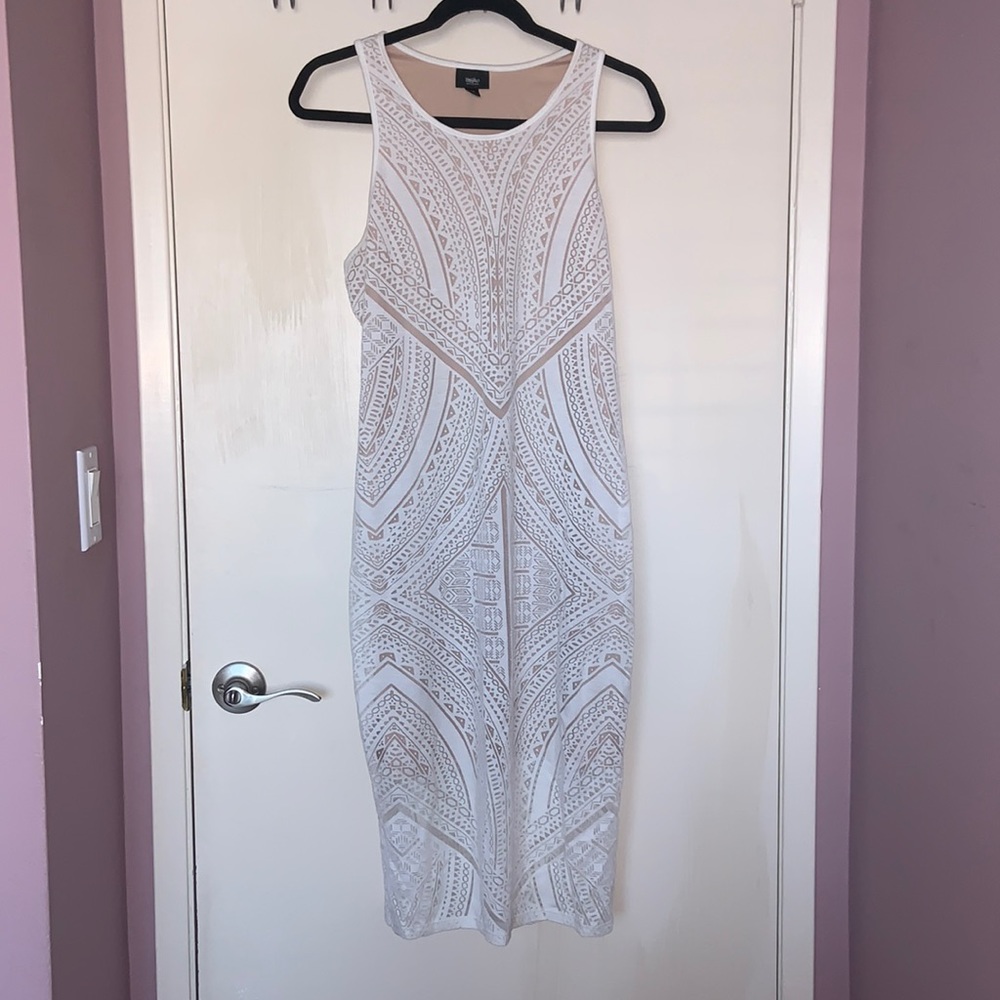 Cut design white dress with beige lining under